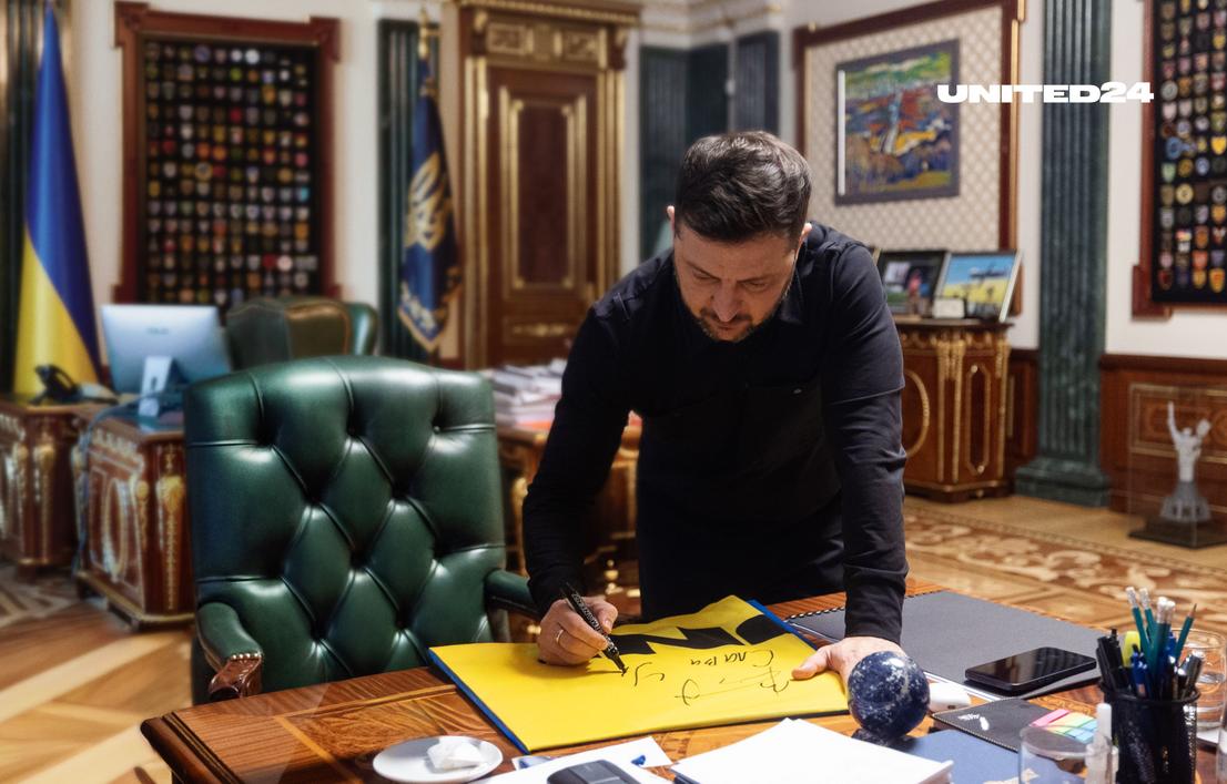 Help Safeguard Ukraine’s Sky and Get a Chance to Own a Ukrainian Flag Signed by President Zelenskyy