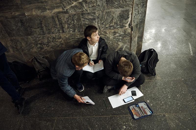 Schoolchildren hide in metro station in Kyiv during a Russian rocket attack. Photos by Kostiantyn Liberov and Vlada Liberova